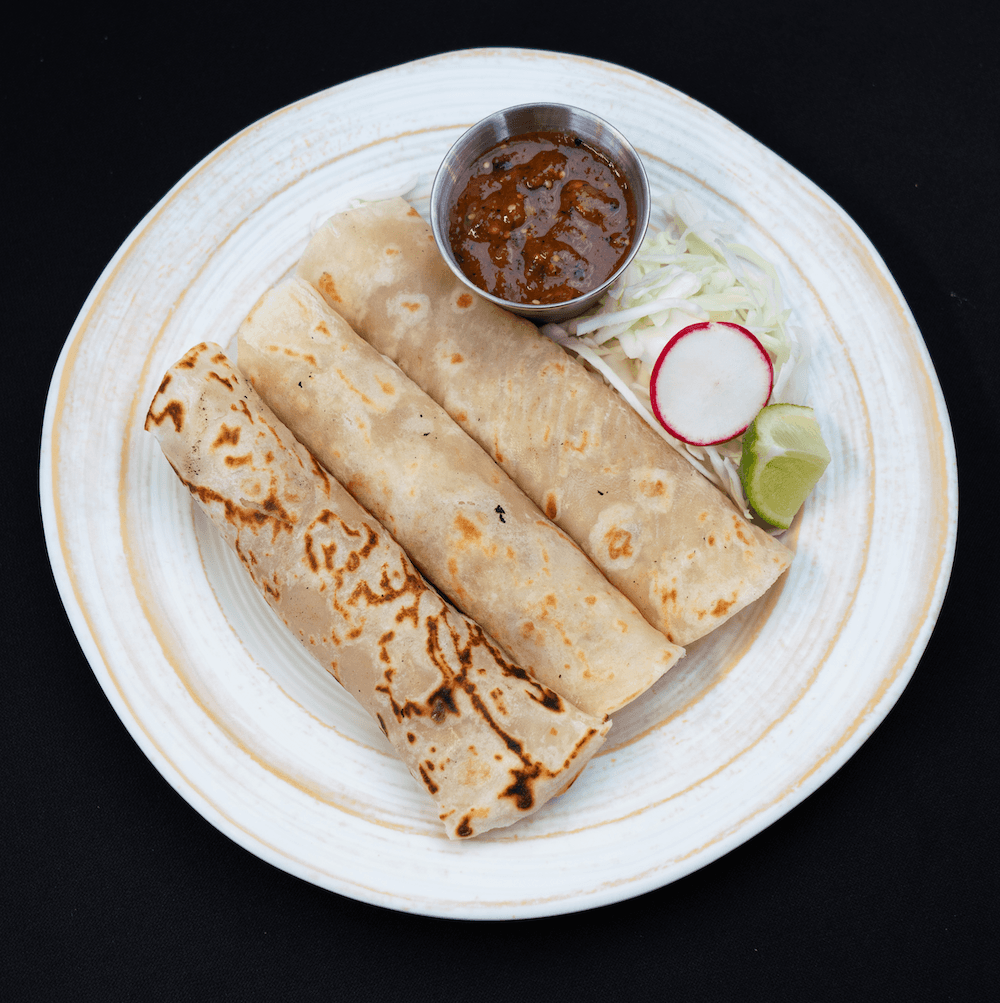 Three High Marea Magic Bean Mini Burritos in house-made flour tortillas